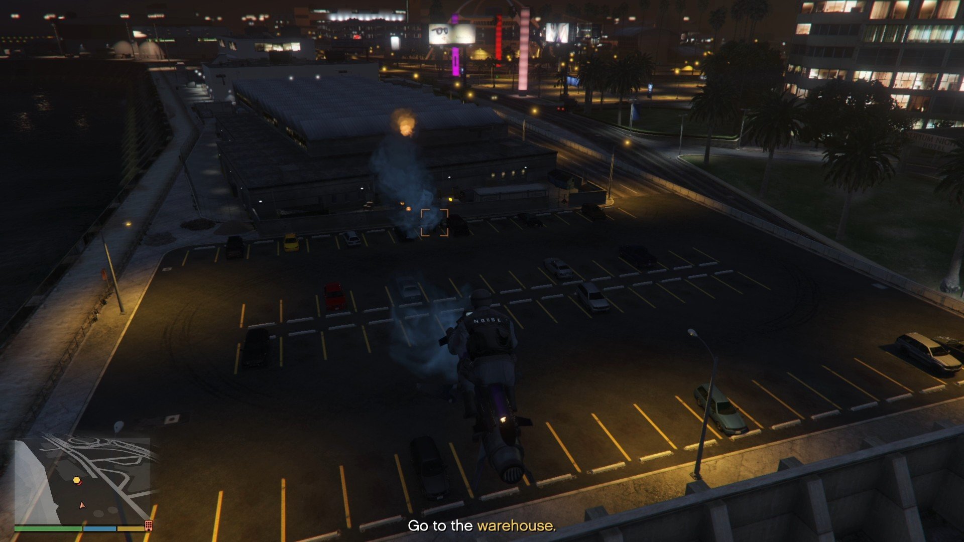 Eliminating the guards outside the warehouse with the thermal charges.