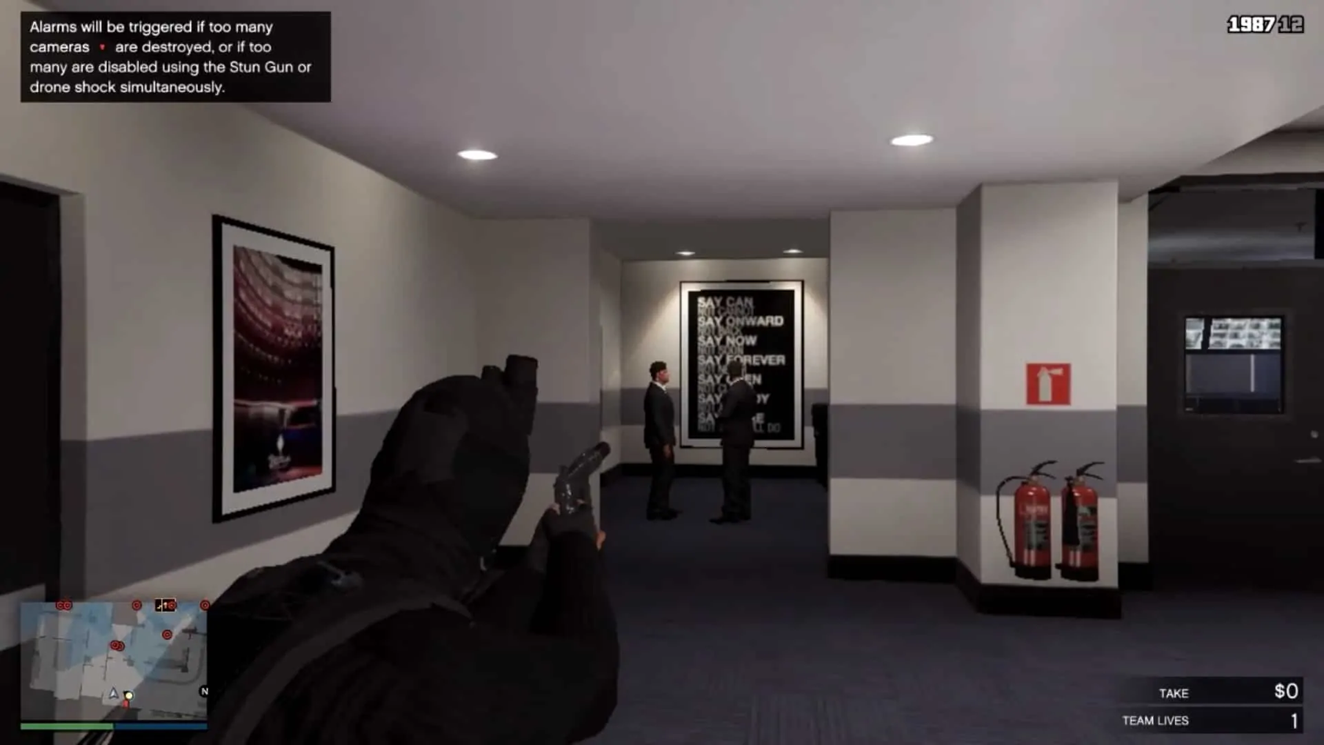 Two guards chatting to your right after taking out the camera