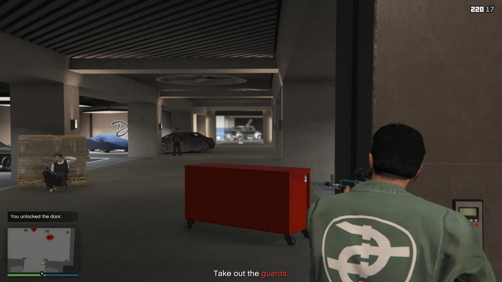 Eliminating the guards before heading inside the casino storage facility.