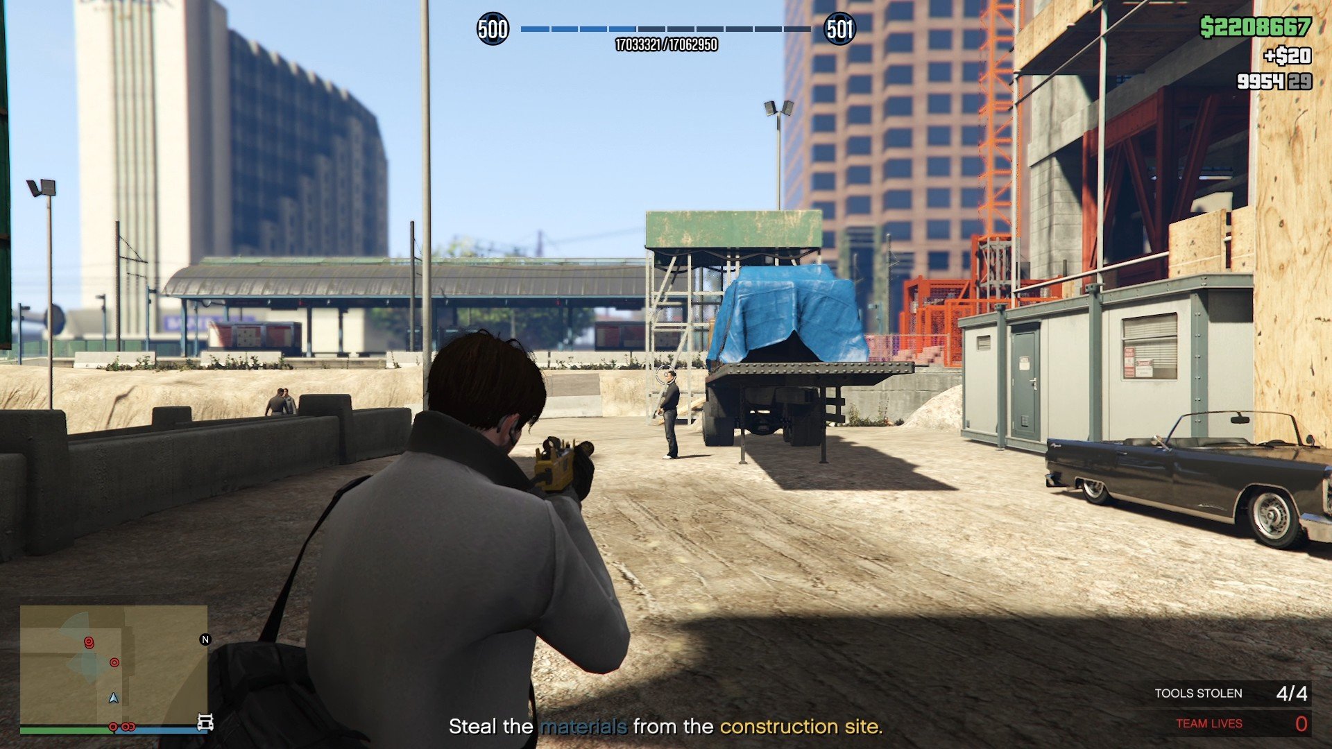 One guard by the materials, and the other two having a conversation on the left side.