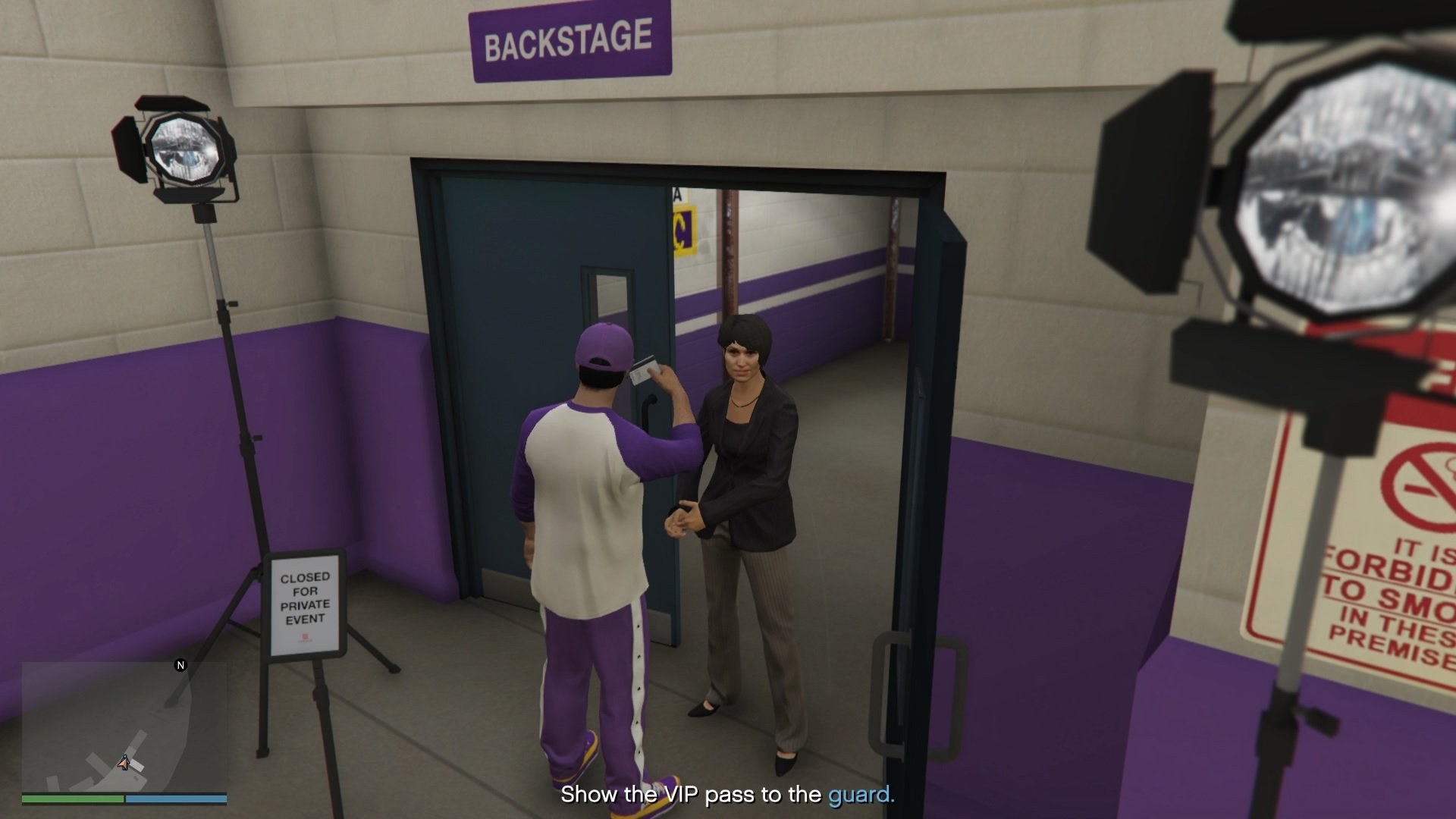 Show your VIP pass to the guard to gain access to backstage.