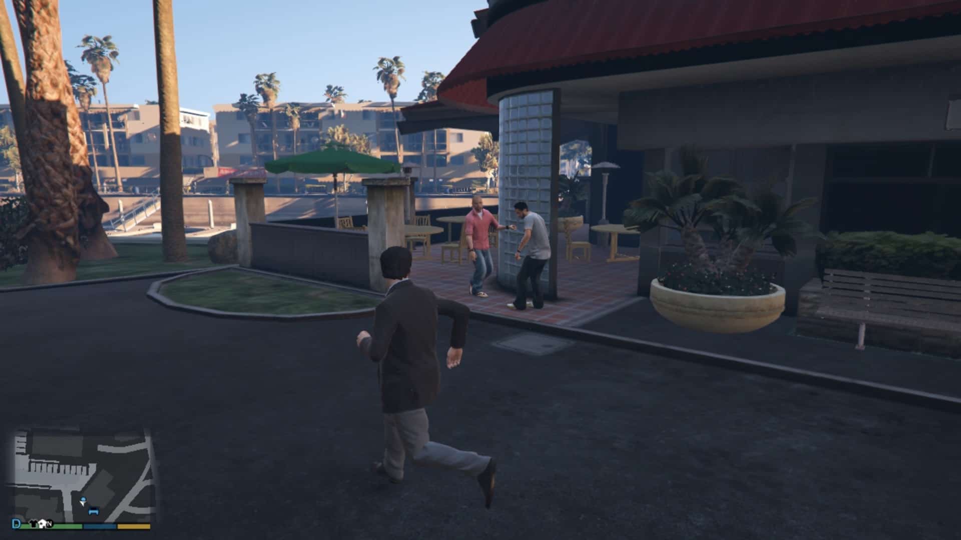 Drunk friends having an argument by the restaurant