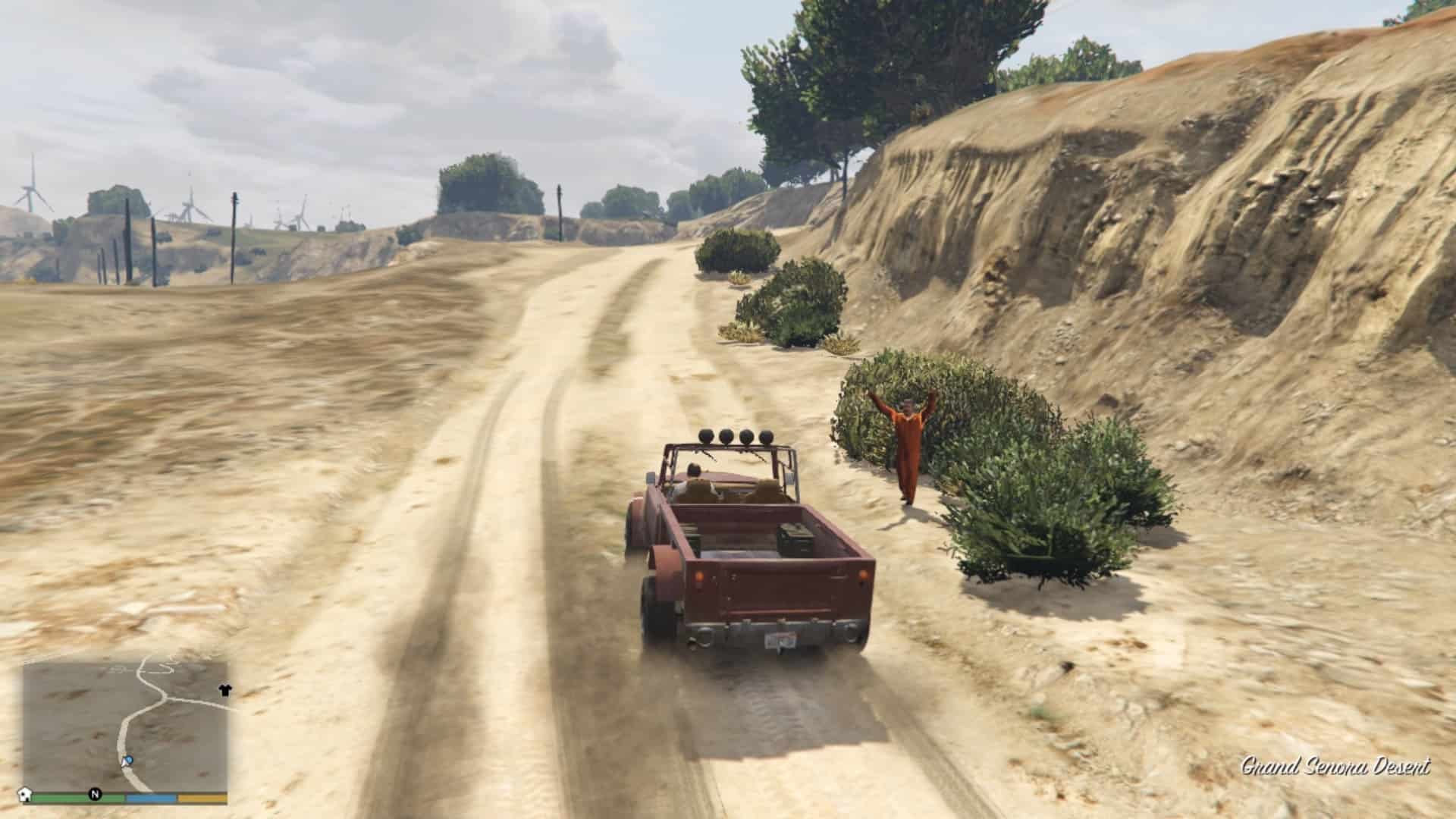 Prisoner coming out of the bush waving his hands asking for hel