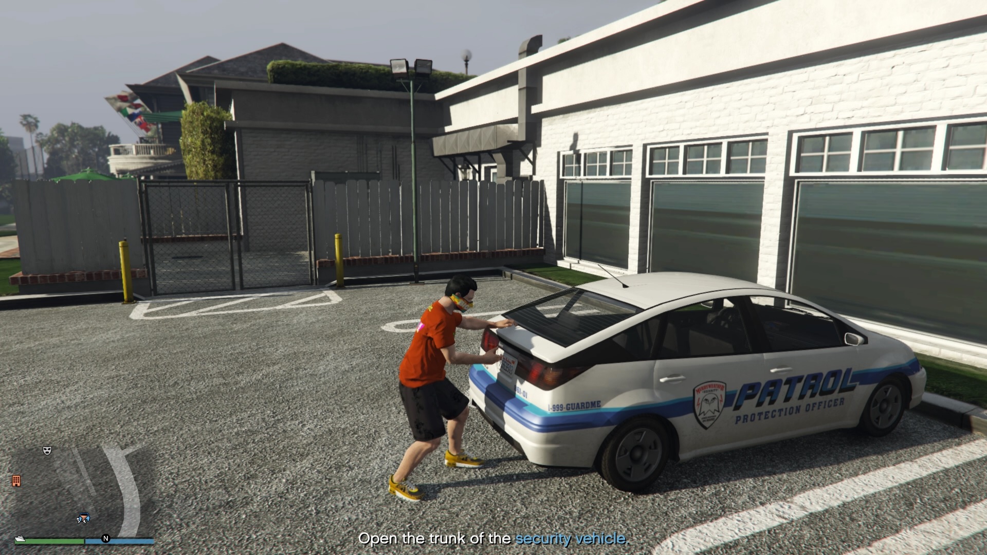 Once located, go to the trunk of the car and open it up to get the stun guns.