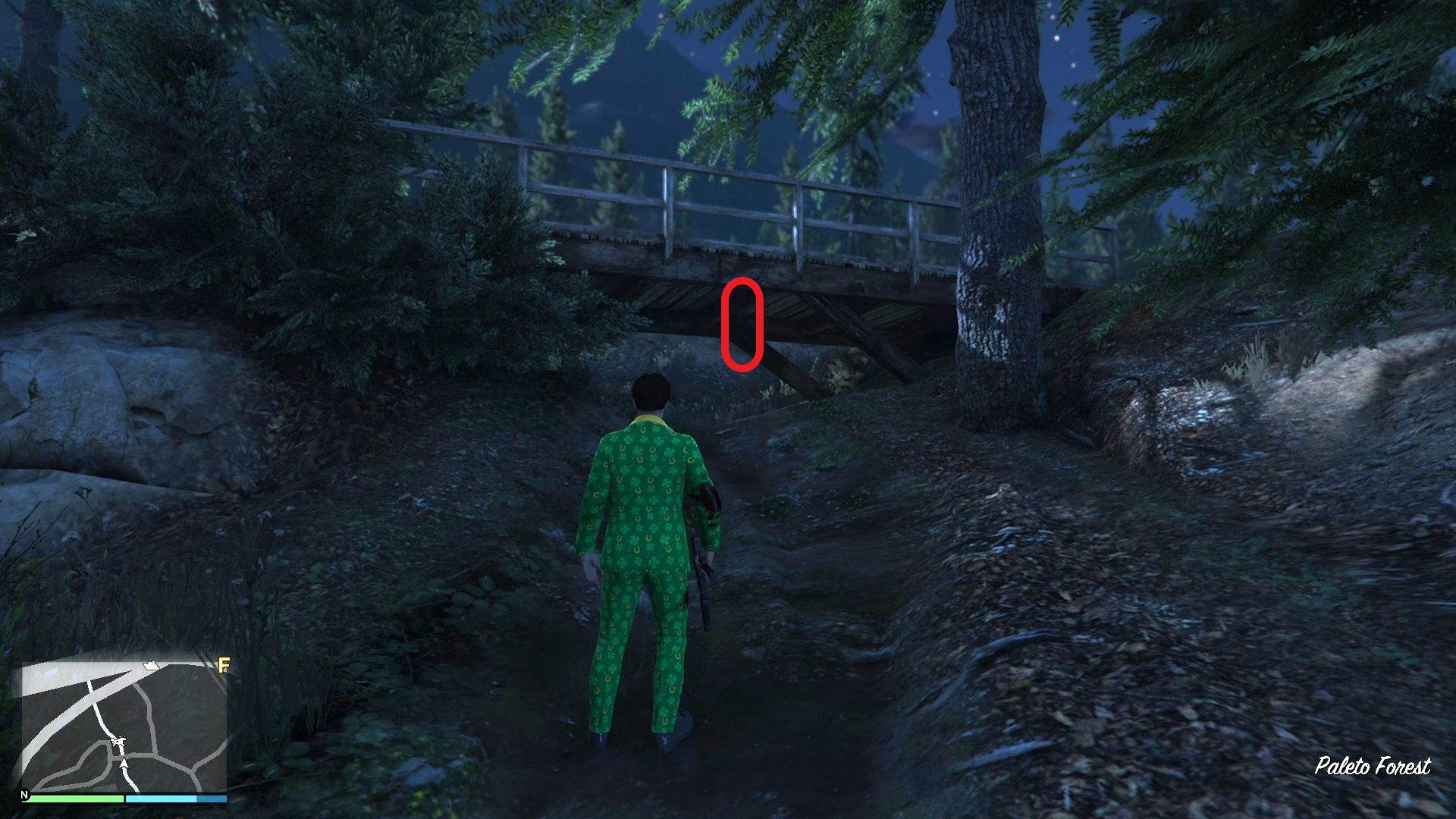 The golden clover will be hanging off the underside of a wooden bridge in Paleto Forest.