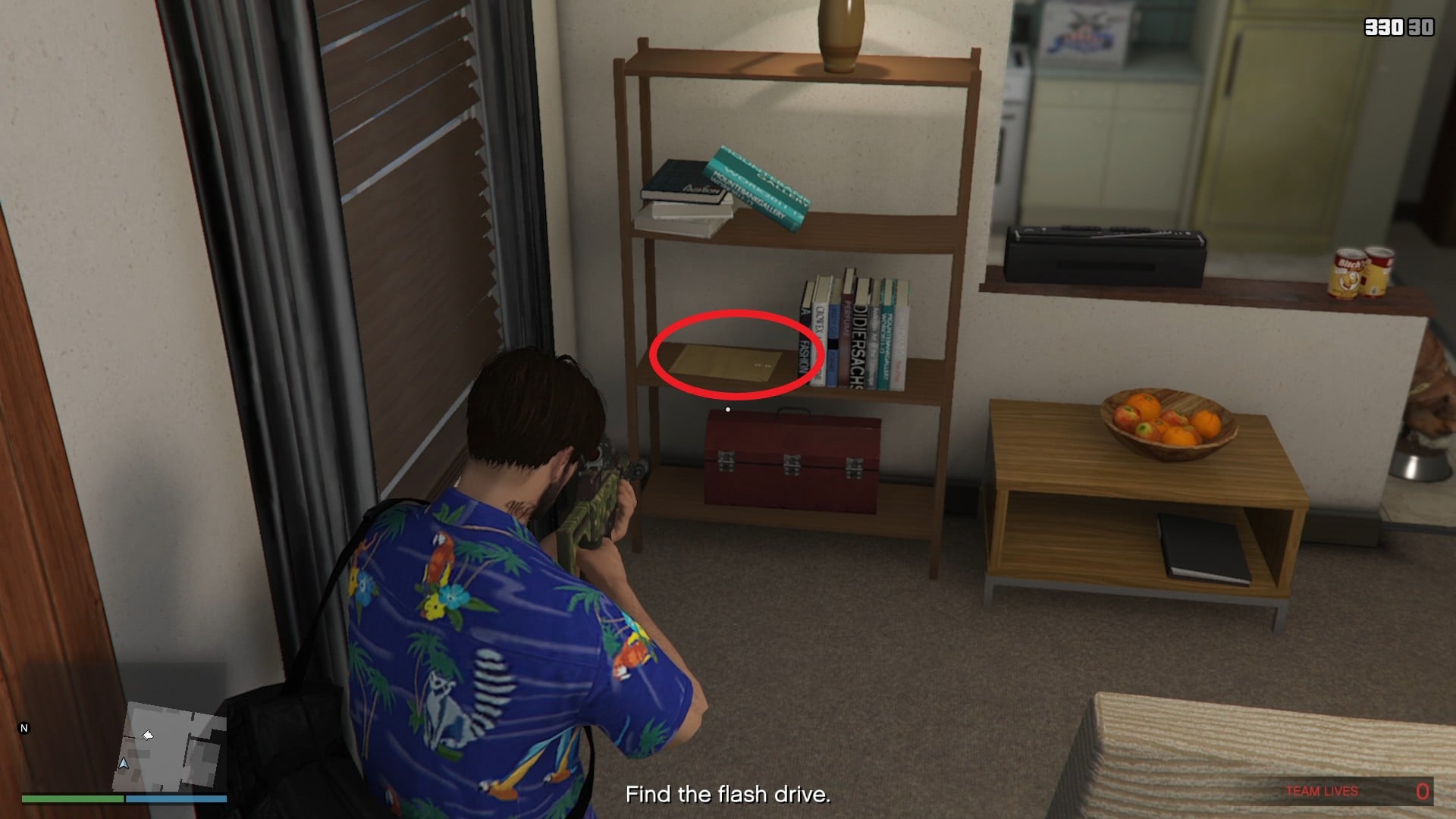 The cocaine is on the big shelf next to the books.