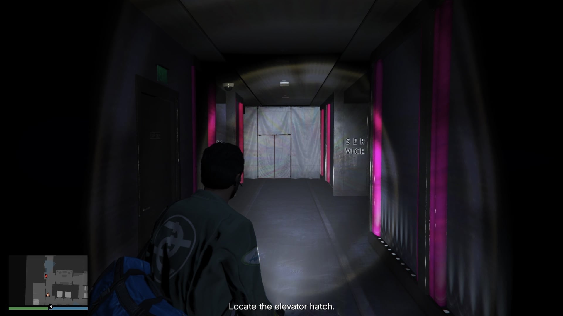 Turn right towards where you see the letters on the wall.