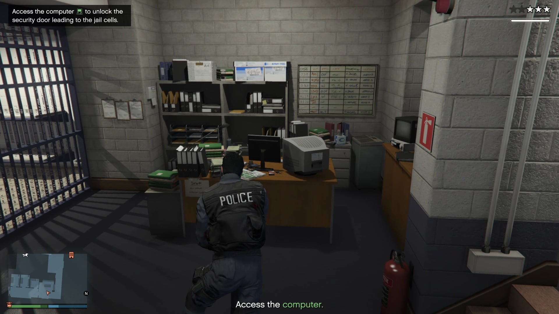 Hack the computer to unlock the security door leading to the jail cells.