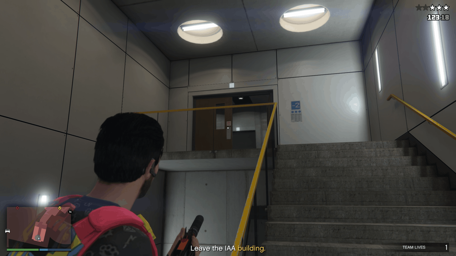 A guard about to come through the door upstairs