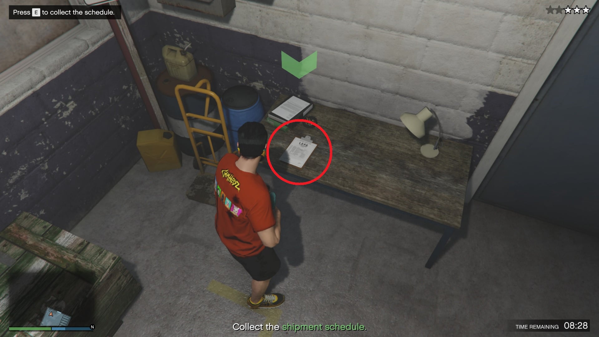 It is either a clipboard or a black folder, usually on one of the office desks or tables around the area.