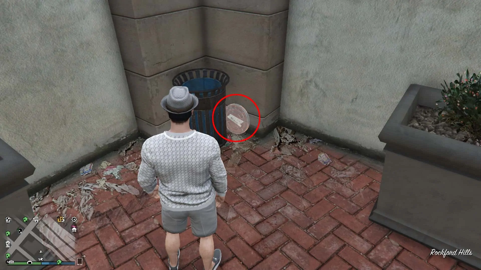 Prop 1 beside the trash bin