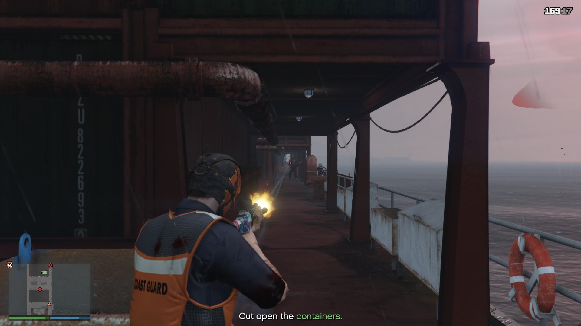 Eliminating the enemies in the distance on the right side of the cargo ship.