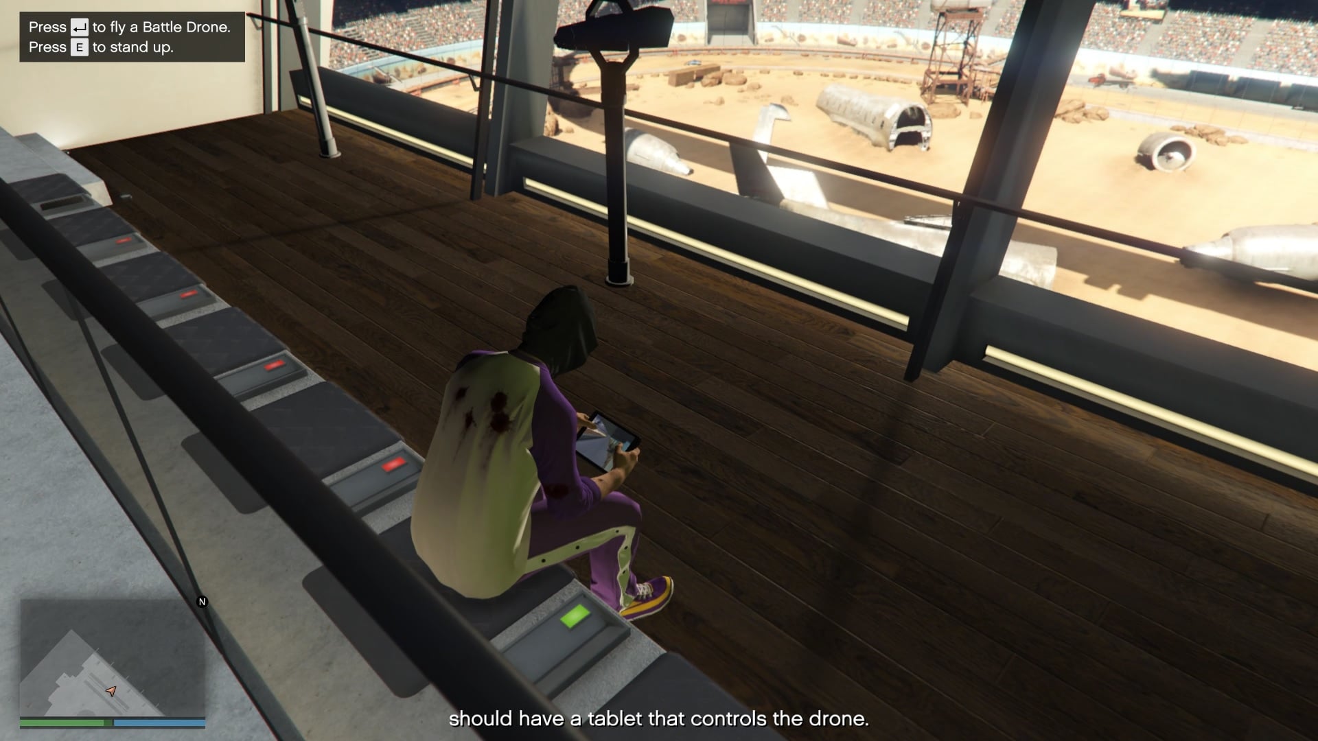 It is the one with the green light just behind the telescopes.