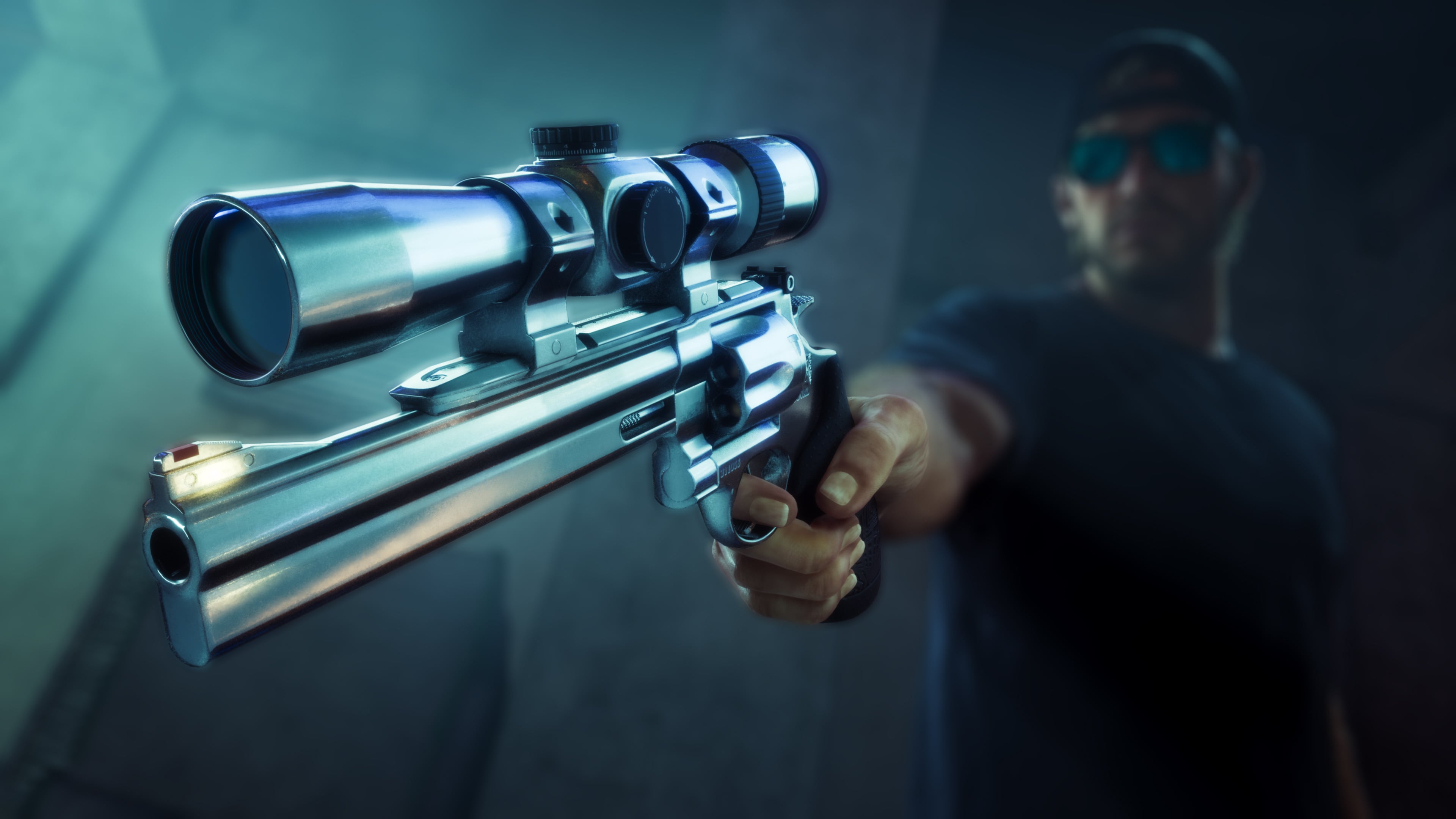 Close-up of a silver revolver with a mounted scope held toward the camera in a dark scene.