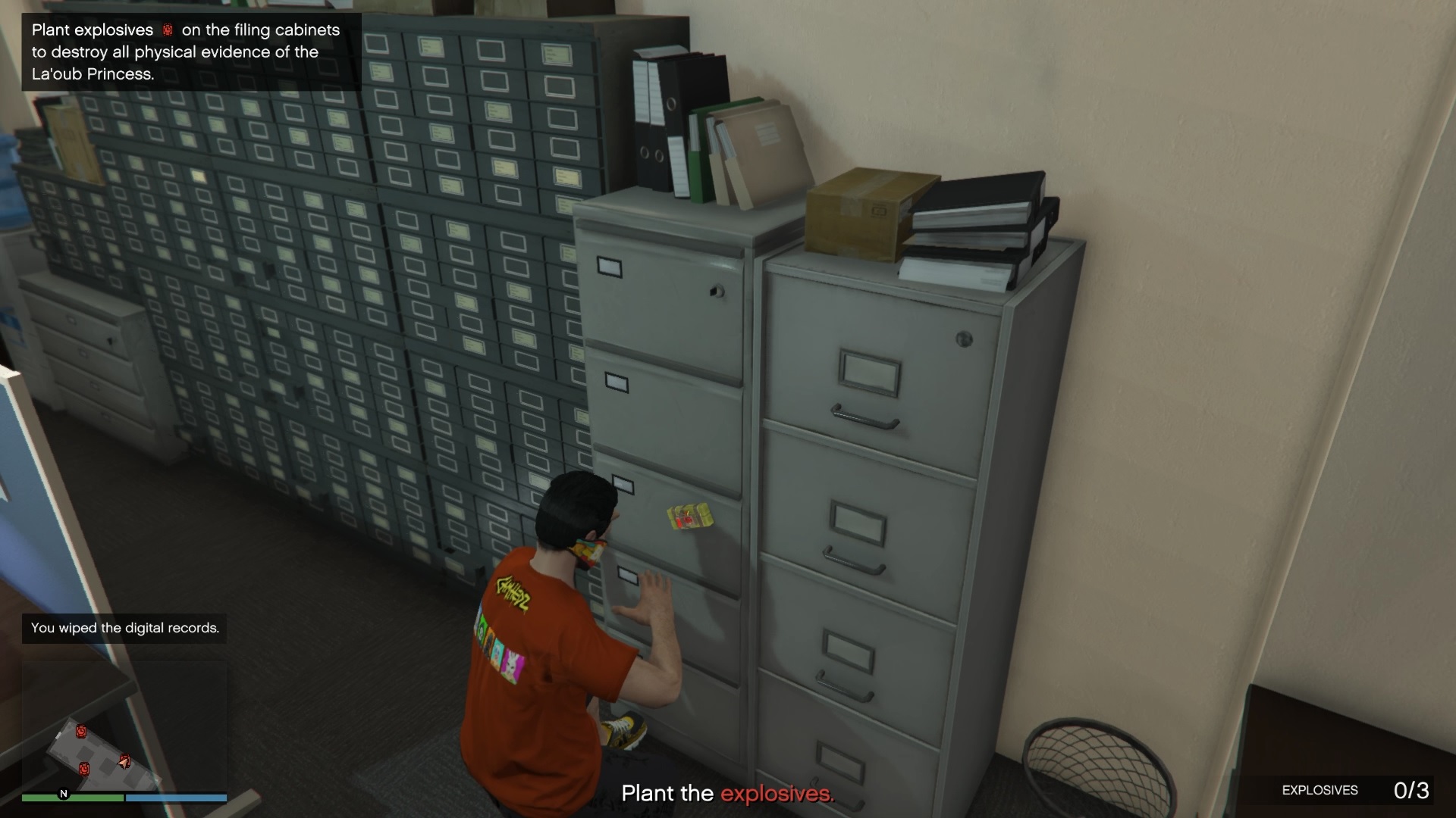 Planting the first explosive.