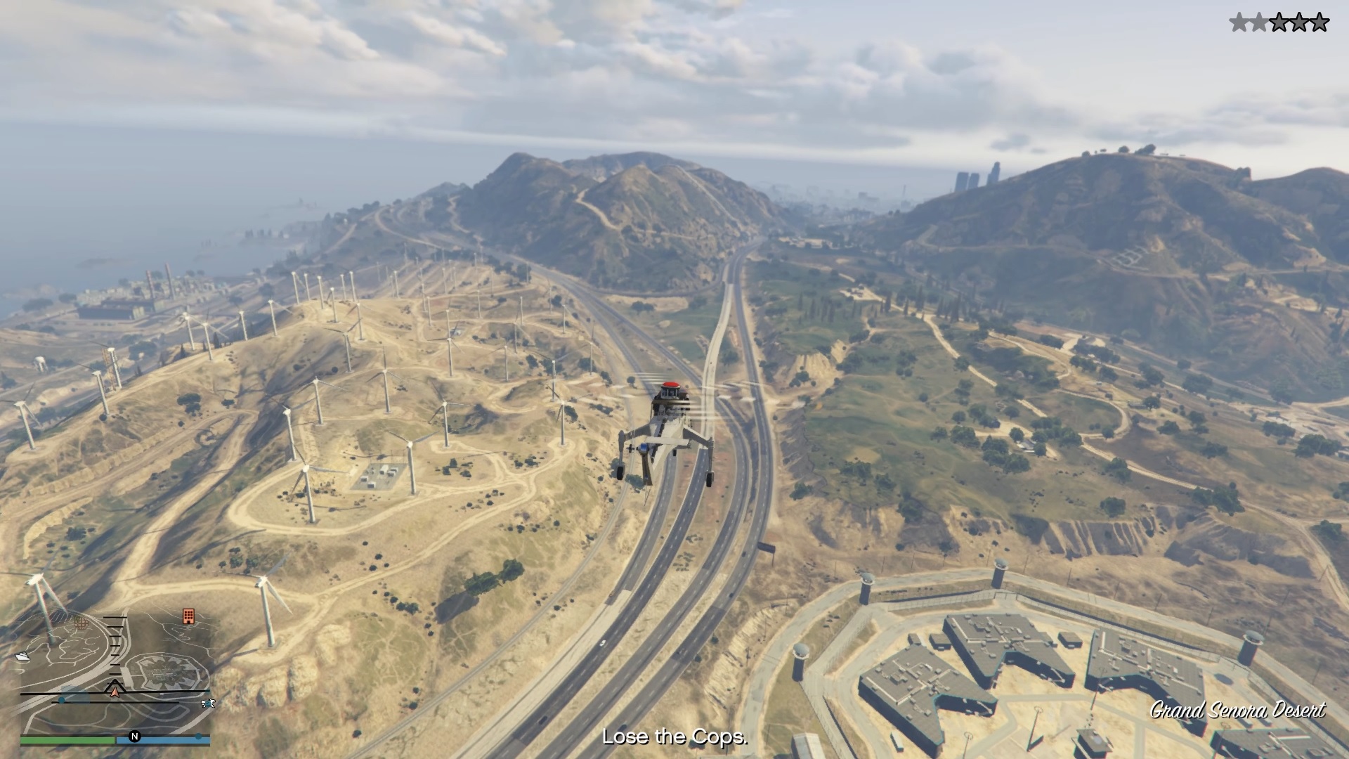 Flying away in the Skylift, trying to lose the cops.