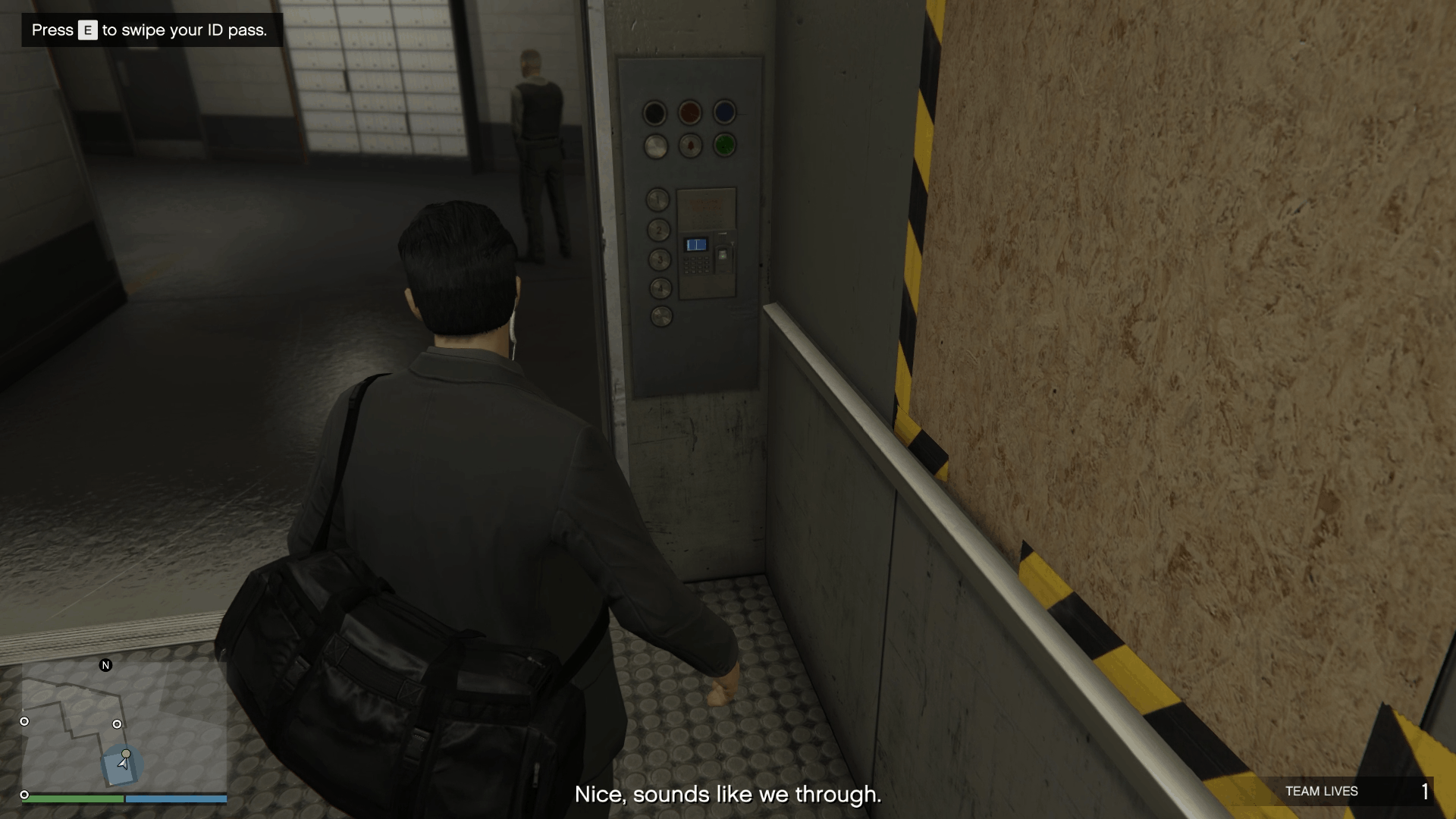 Swiping the ID badge to activate the elevator