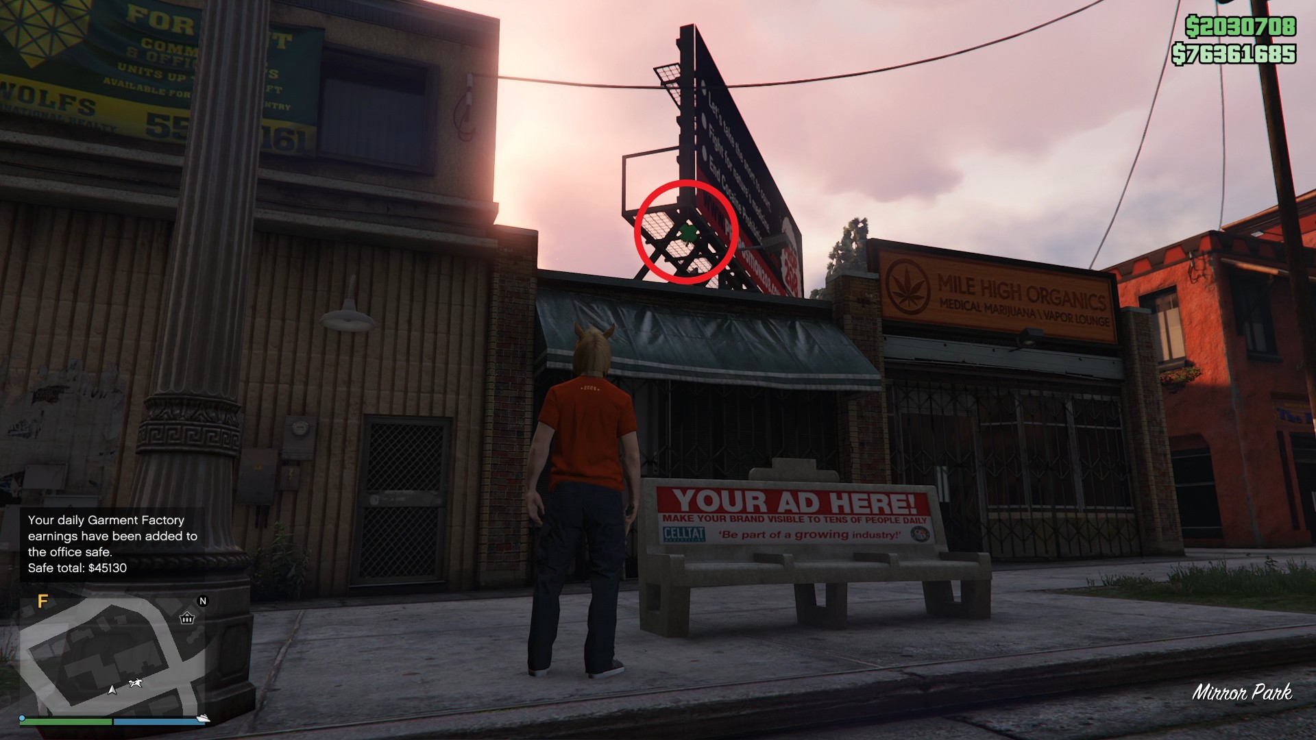 The lucky clover is hanging on a billboard in Mirror Park.