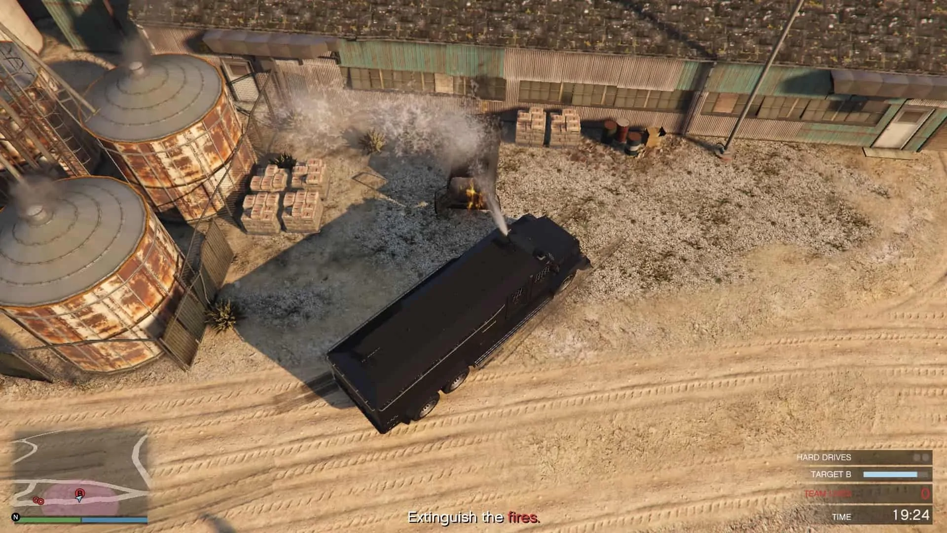 Fire being extinguished at the first location