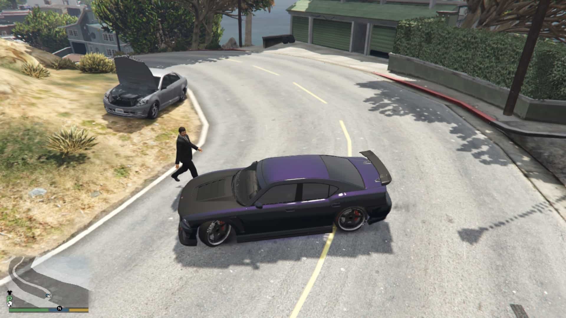 Timm and his broken down car on the sid