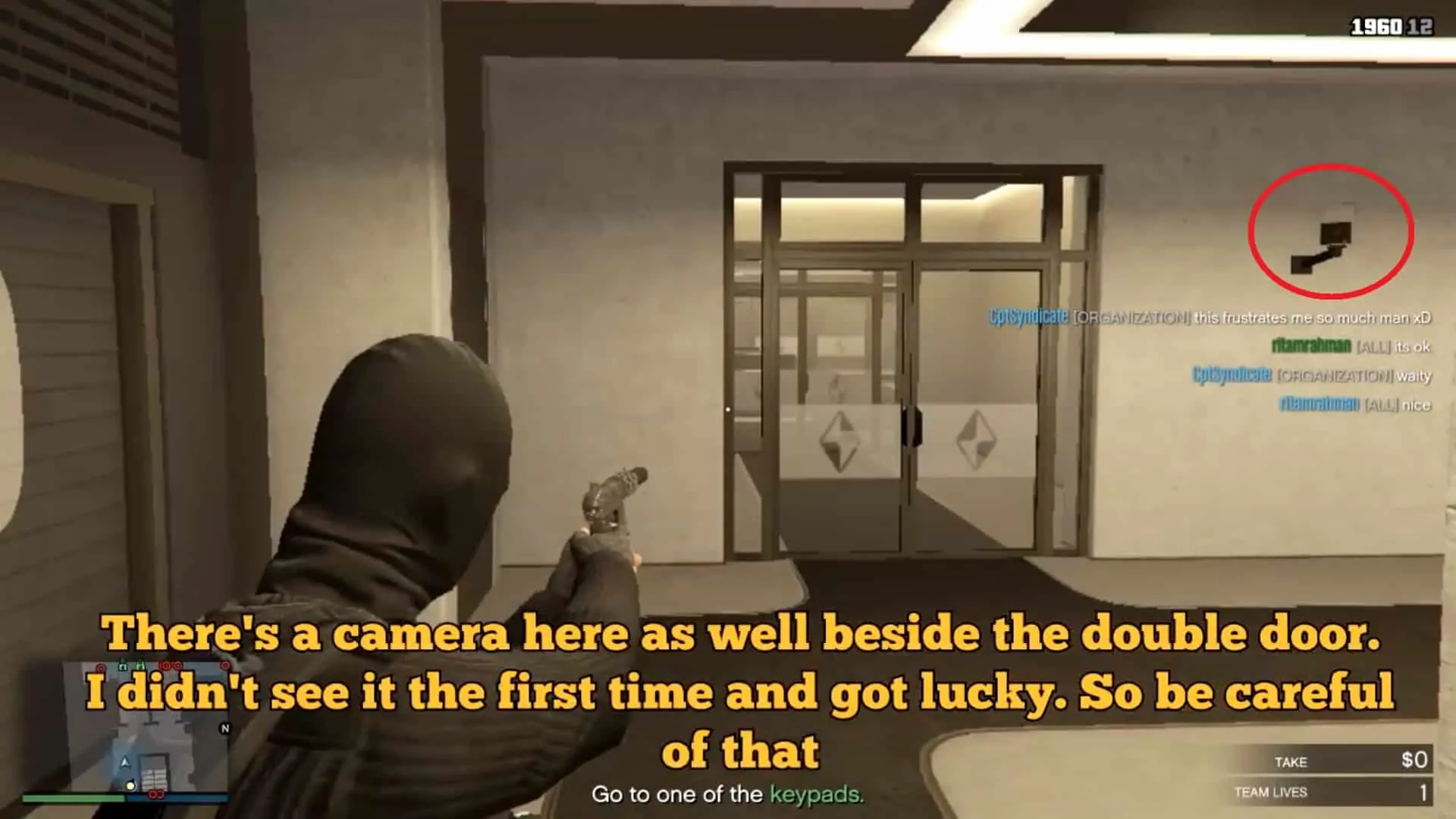 The camera you need to be careful of before entering the double doors ahead