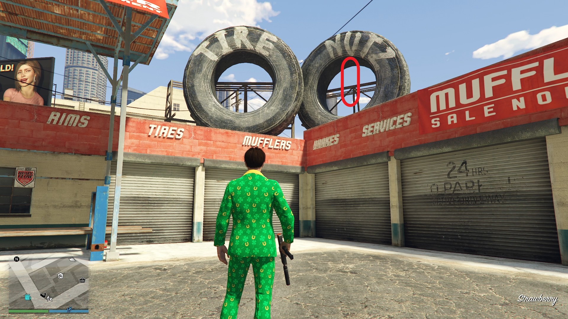 The golden clover will be hanging inside the opening of the giant decorative tire on the roof of the Tire Nutz auto shop in Strawberry.