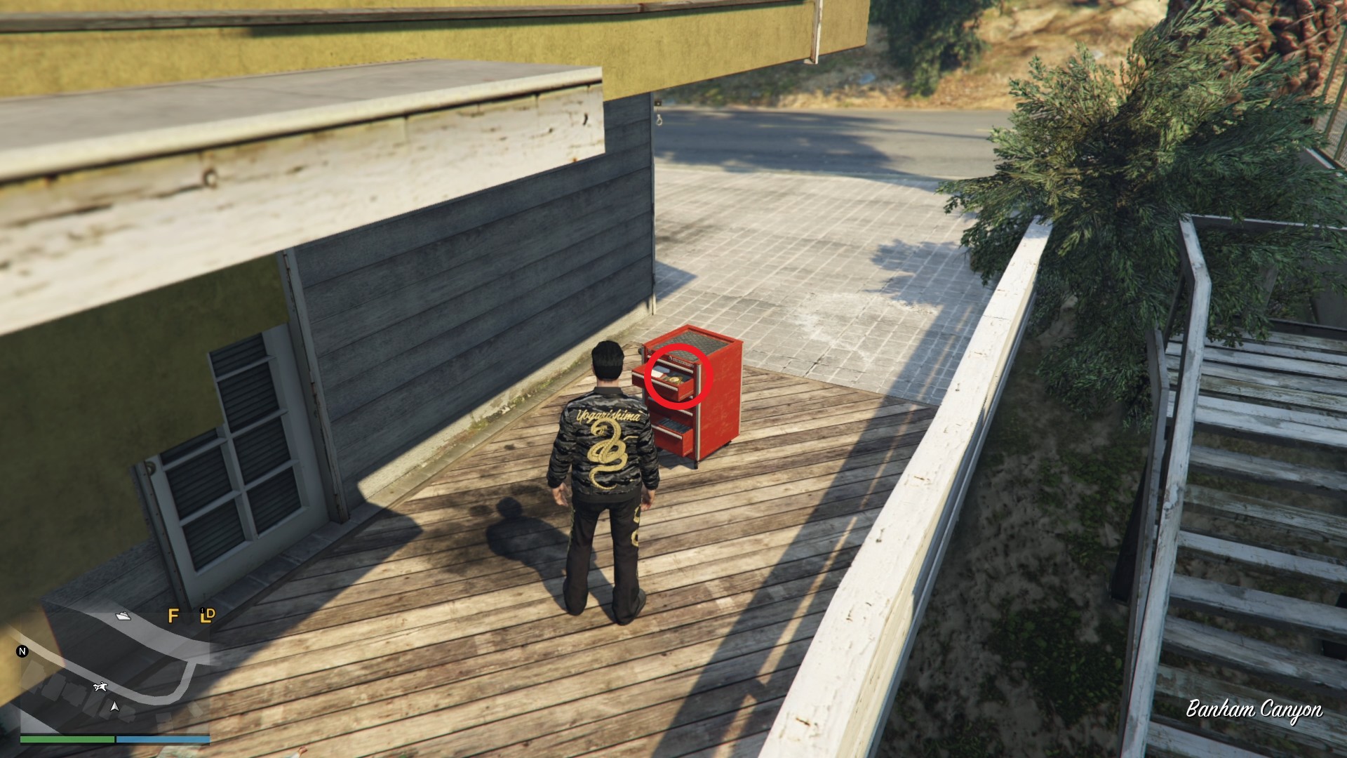 The Yuanbao is inside a red tool chest.