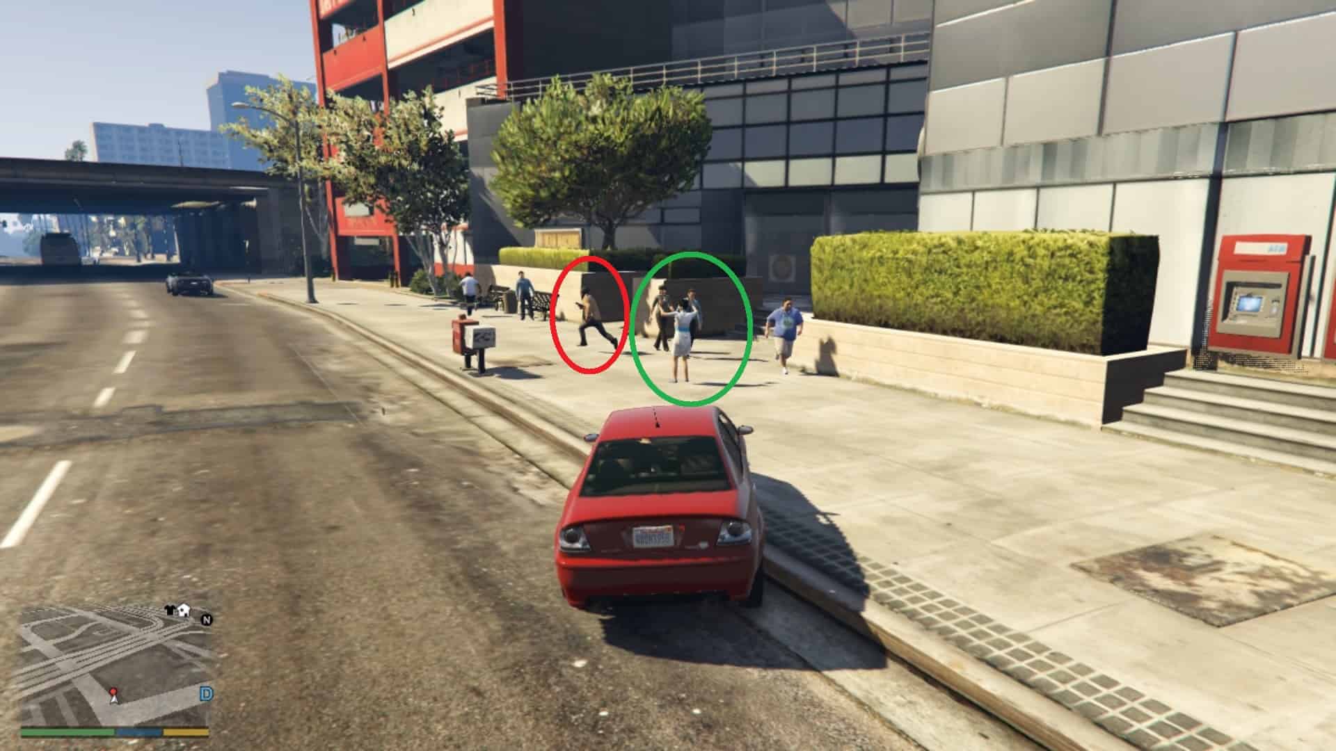 Robber (circled in Red) running away after robbing the lady (circled in Green) who is having her hands up as she was being held at gunpoint prior to the guy running away