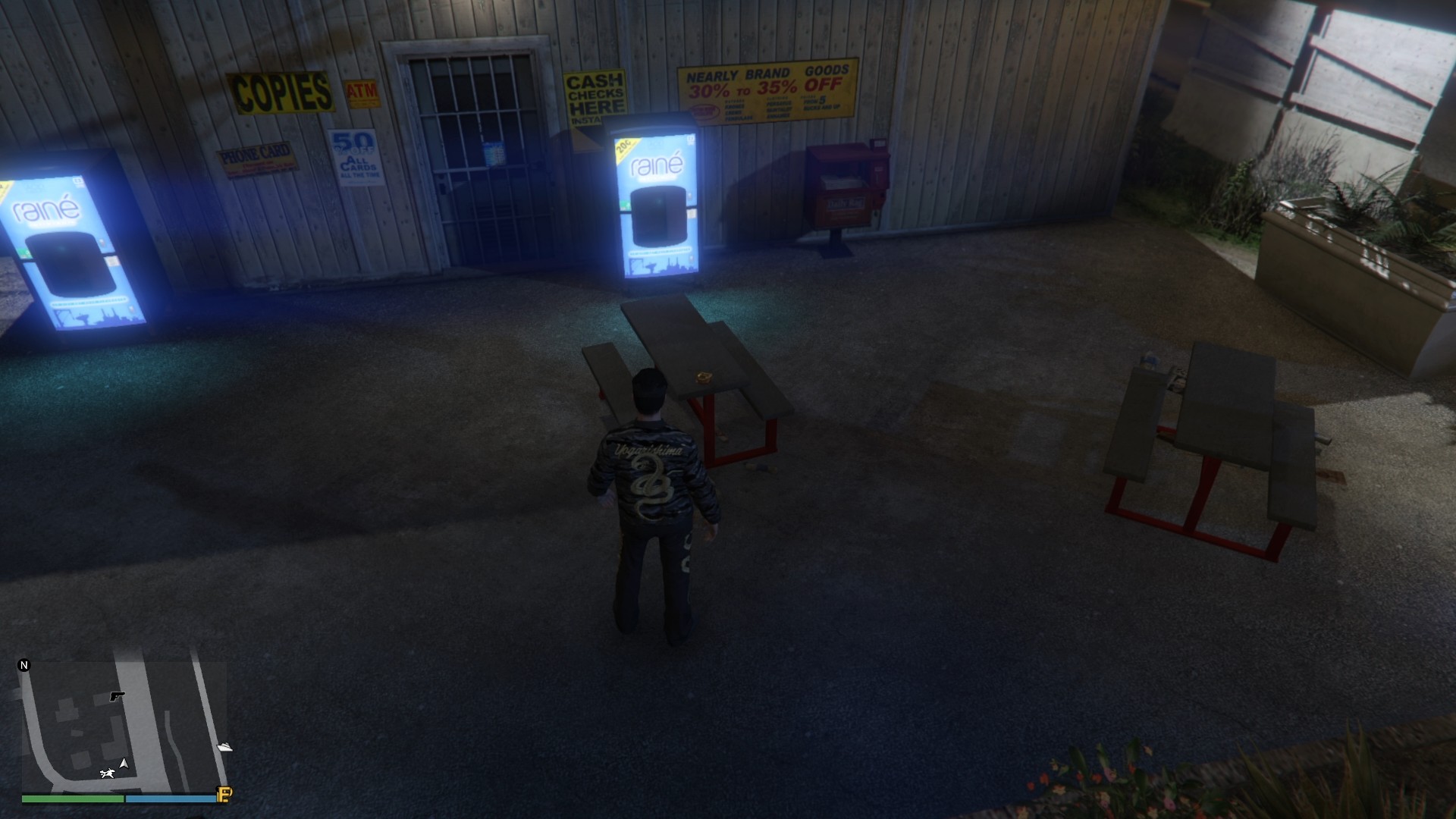 The Yuanbao is on a picnic table at the Paleto Bay market.