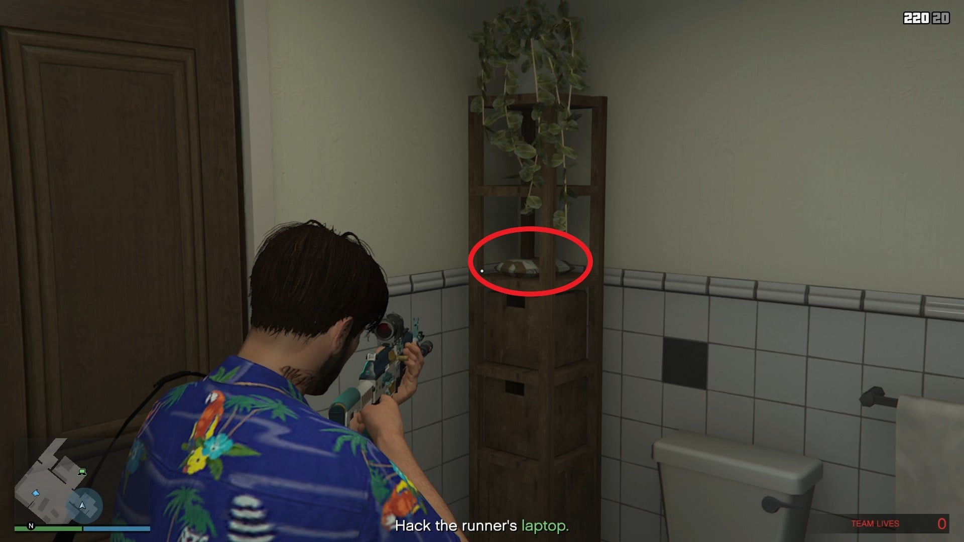 The cocaine is on the wooden shelf inside the bathroom.