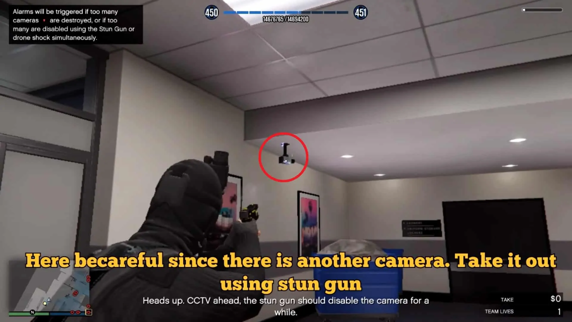 The camera to your left after you go through the metal detector