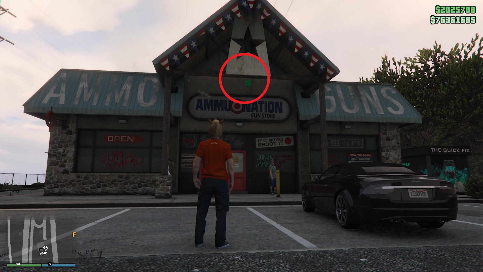The lucky clover is hanging above the entrance of the Ammu-Nation gun store in the Tataviam Mountains.