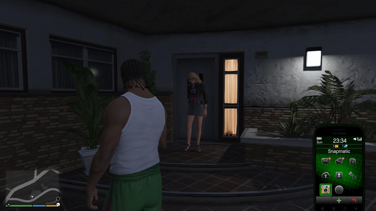 Lacey Jonas standing in front of her house in Vinewood Hills after you drop her of