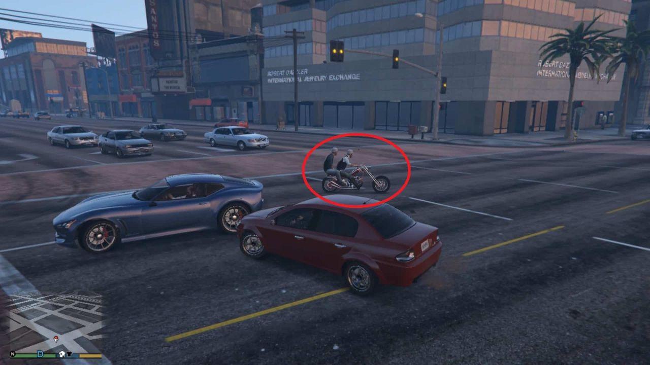Lost MC members riding away after robbing the ma
