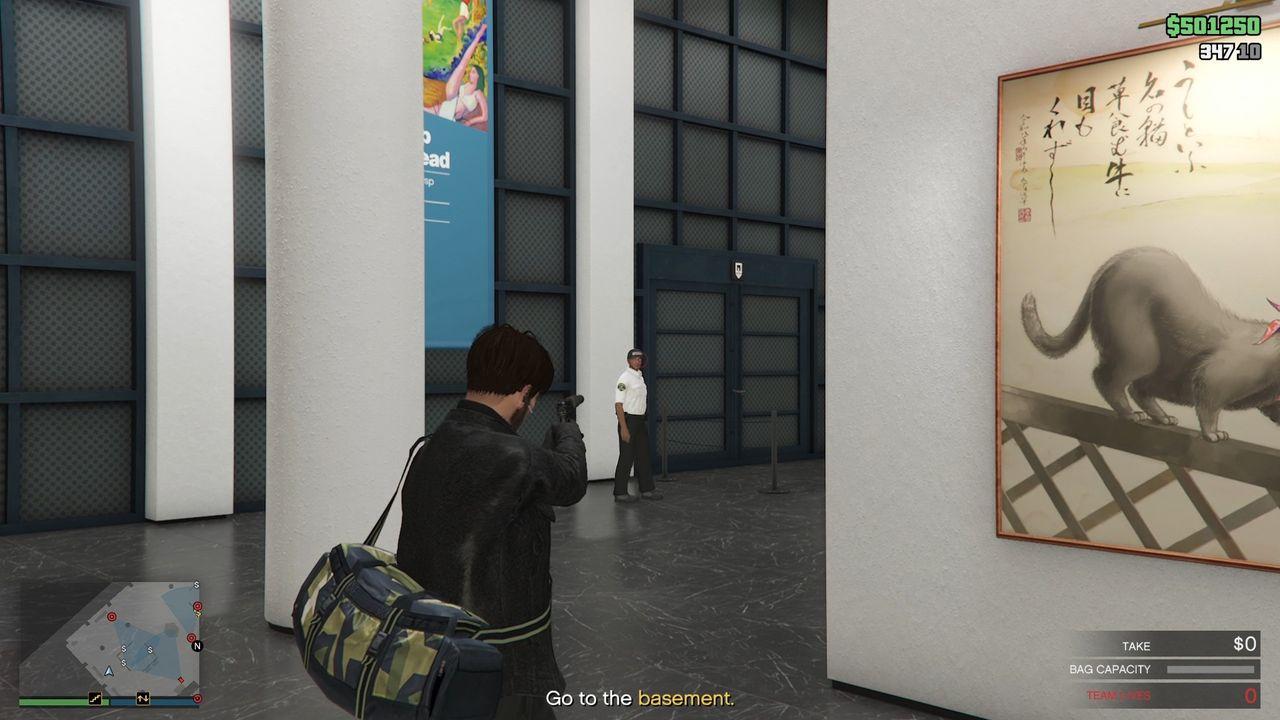 The guard on the far left side of the exhibition room as you enter it via the Staff Entrance.