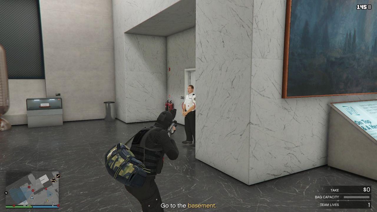 The first guard to your right after dropping in.
