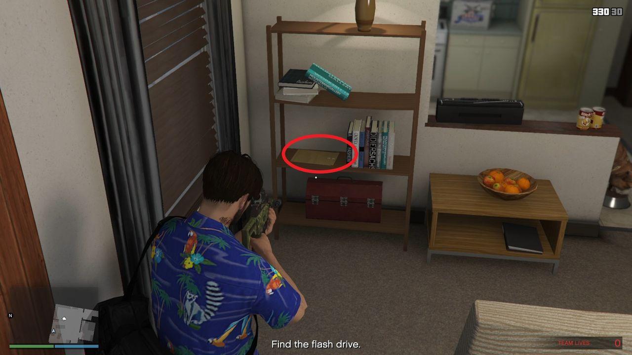 The cocaine is on the big shelf next to the books.
