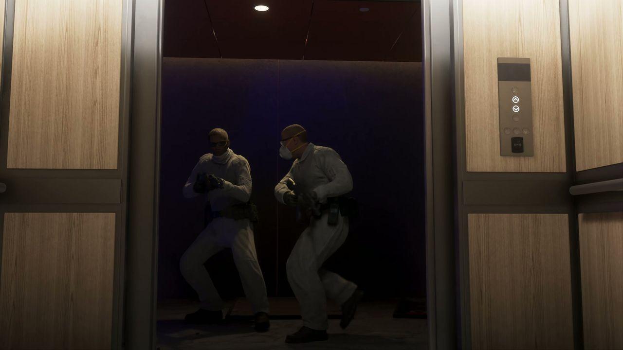 Two men fight inside an elevator during the high-rise assault.