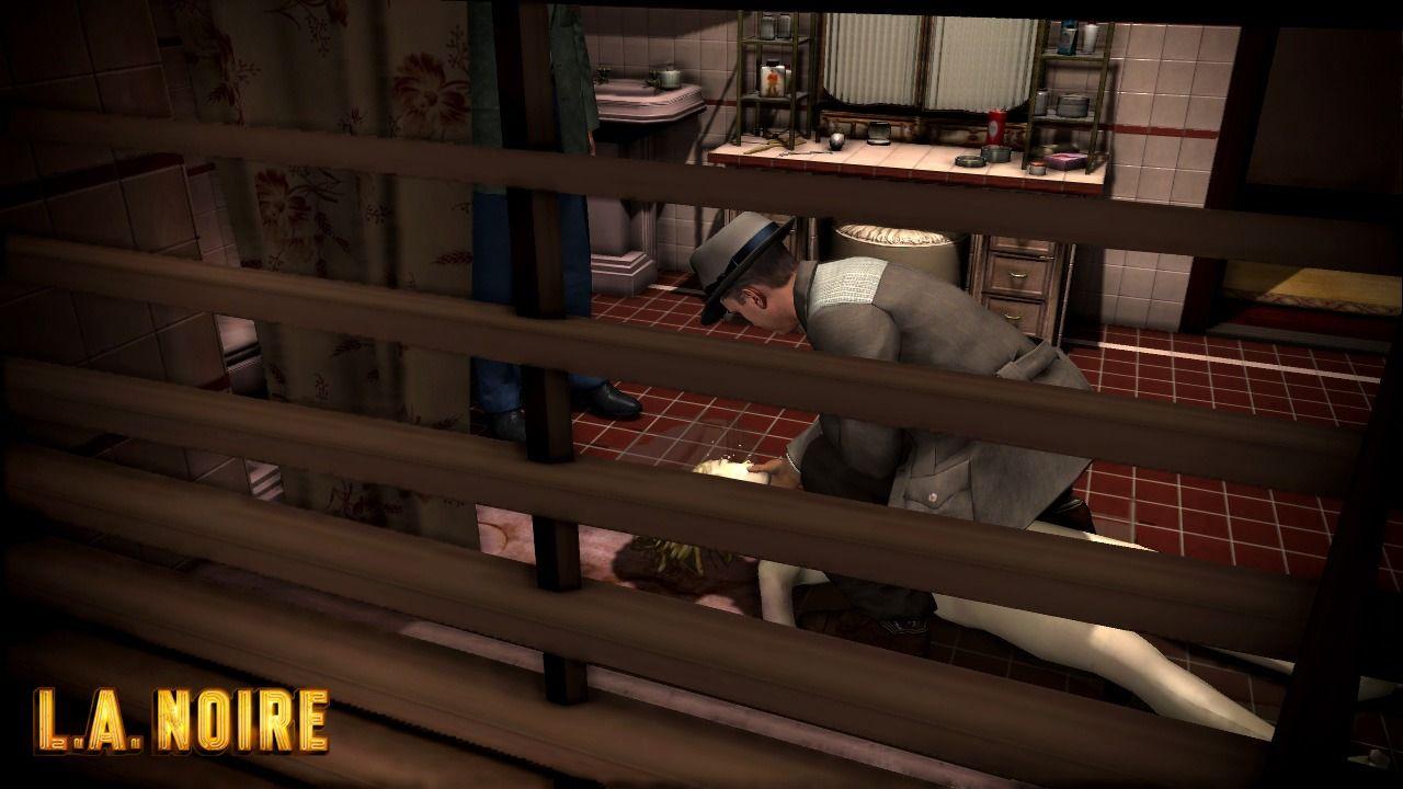 Official L.A. Noire screenshot showing Cole Phelps inspecting a dead body.