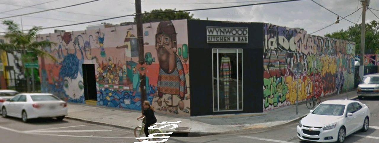 The Wynwood building at 2562 NW 2nd Avenue has the same art-covered street presence.