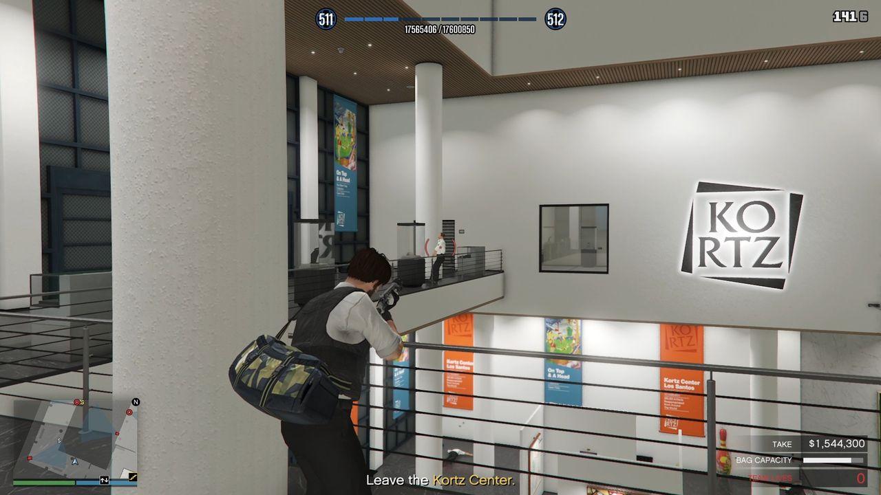 The guard leaning against the rail on the balcony of the upper floor.
