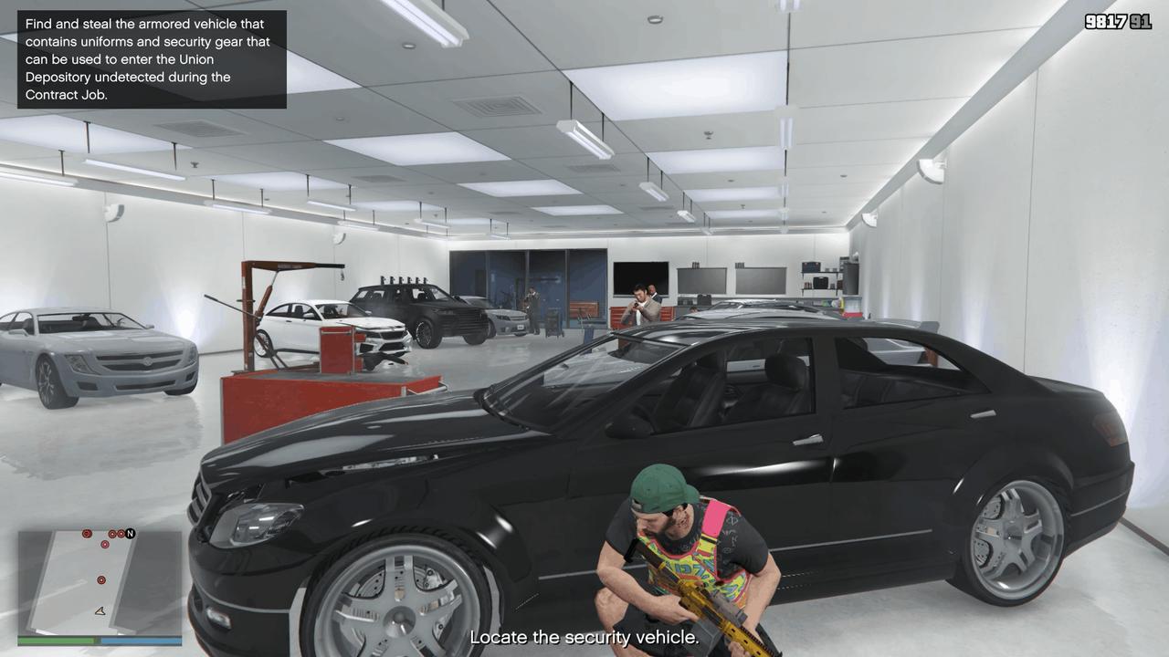 Taking cover behind the car in the garage