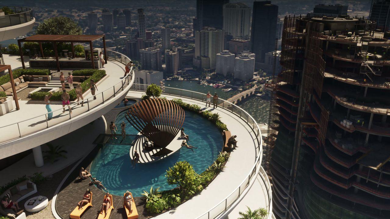 A rooftop pool terrace looks out over the city.