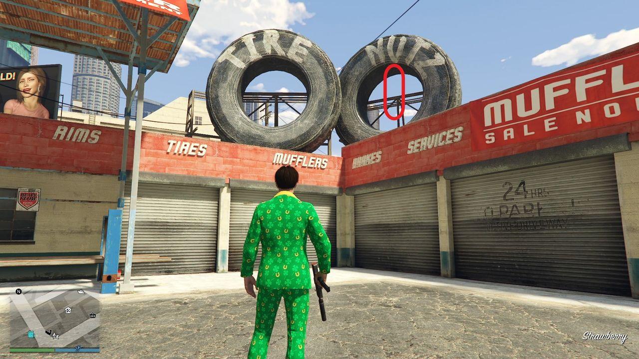 The golden clover will be hanging inside the opening of the giant decorative tire on the roof of the Tire Nutz auto shop in Strawberry.