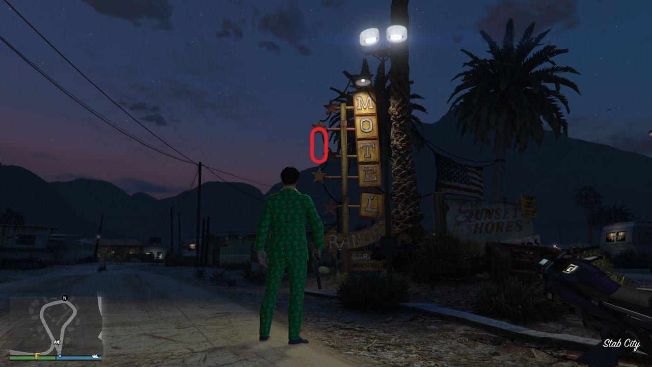 The golden clover will be hanging off the star decoration next to the "O" on the Motel sign right outside Stab City.