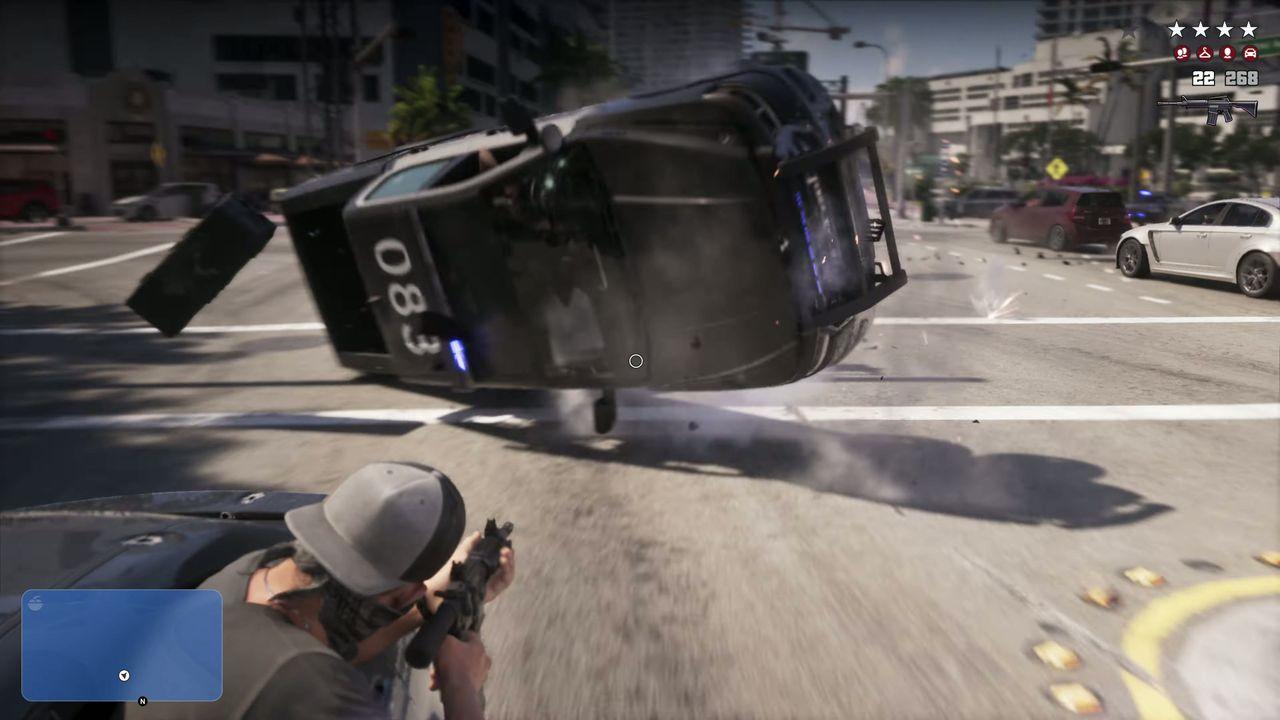 A police cruiser rolls through the air during the chase.