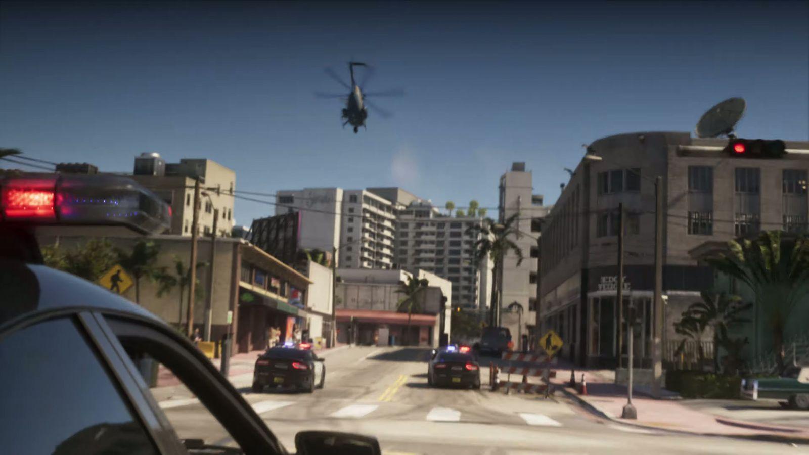 Police close the road as the pursuit races through Vice City.