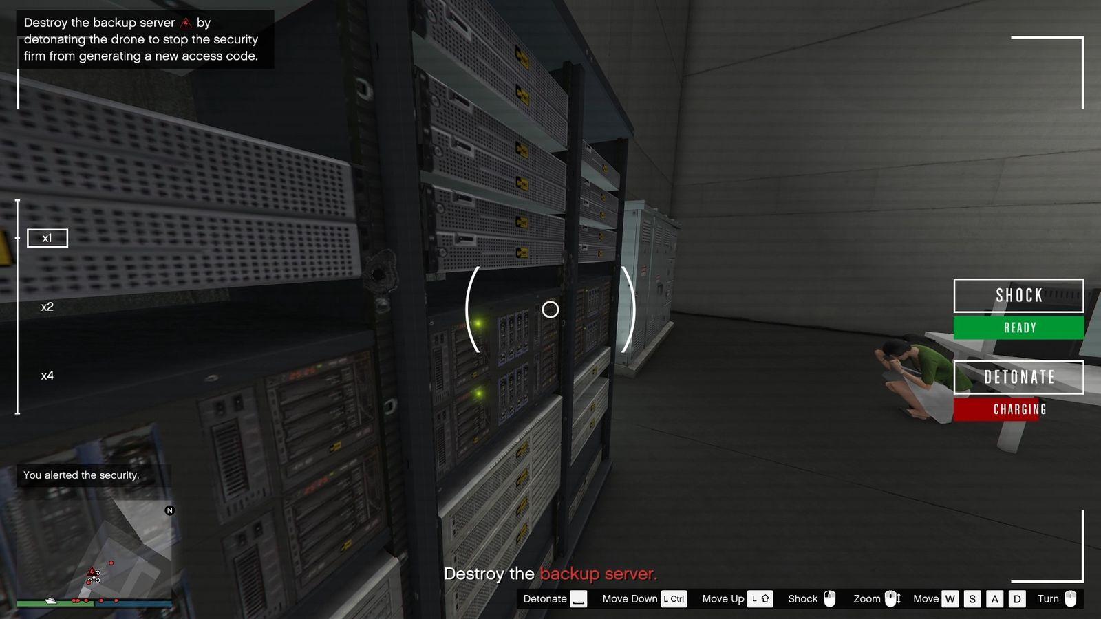 Holding the detonation button to charge it up.