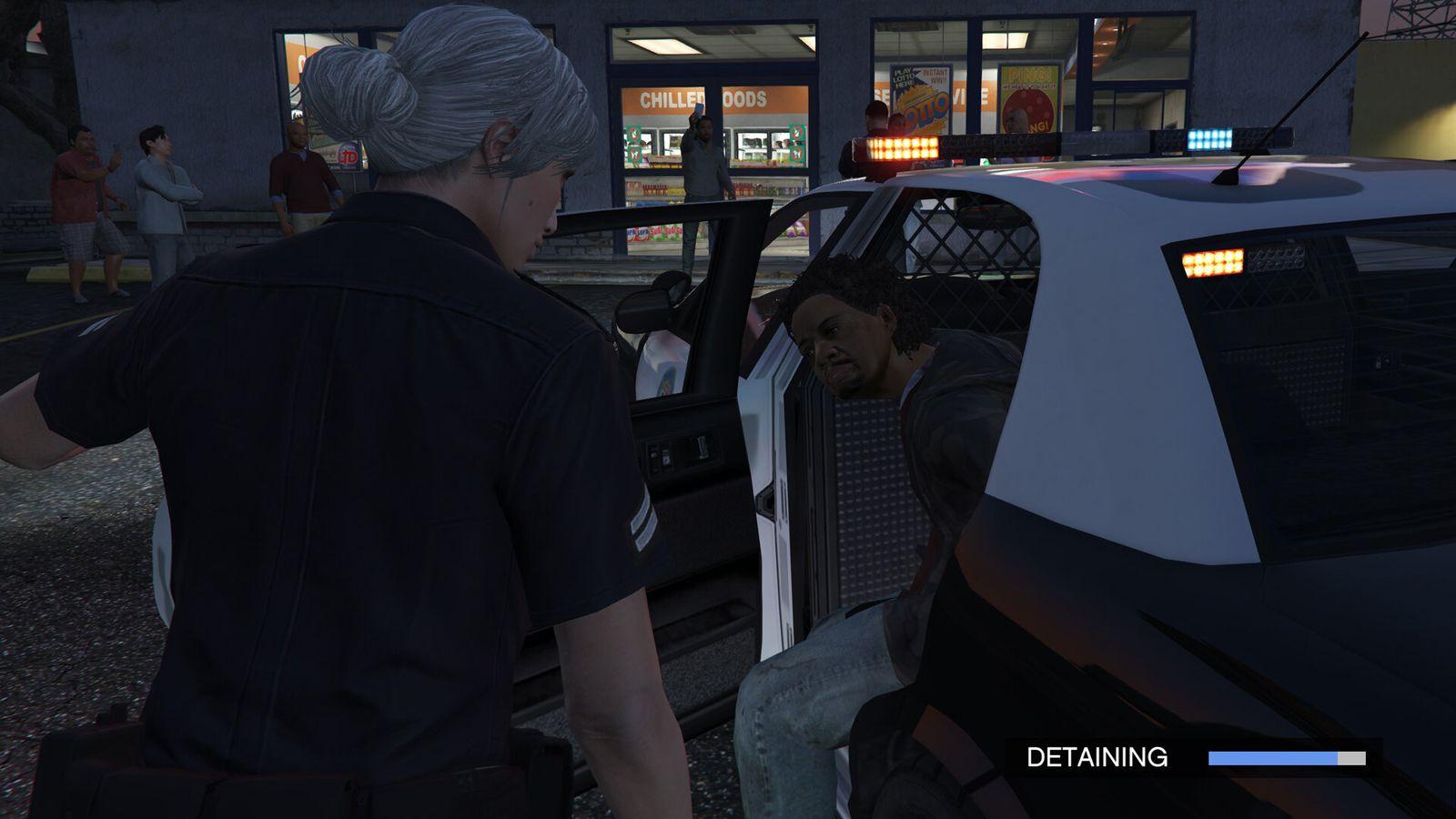 A police character detains a person beside a patrol car in LSPDFR.