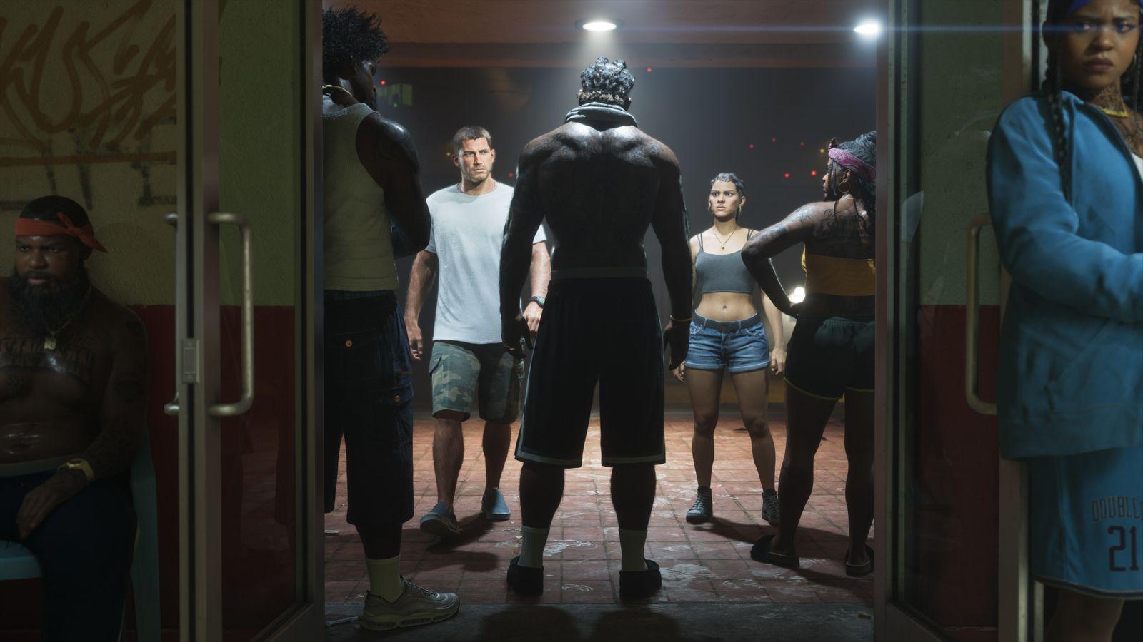 Jason and Lucia enter a crowded fighting gym.